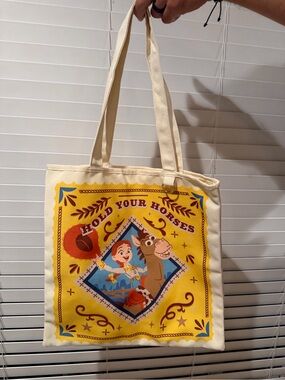 Disney Toy Story Jessie and bullseye Yellow 'Hold Your Horses' Cartoon Tote Bag